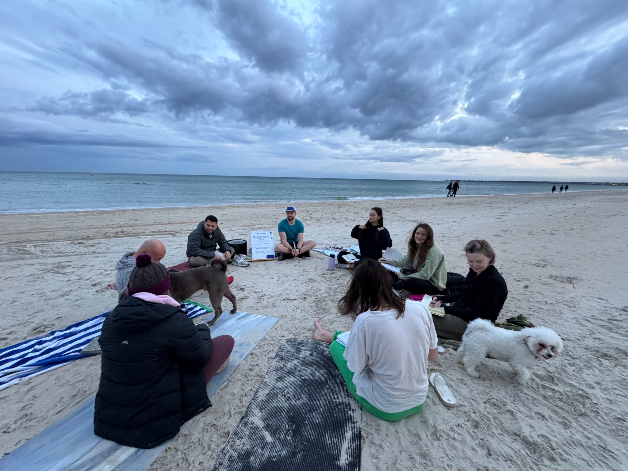 Life Creators community journaling together on Aspendale beach